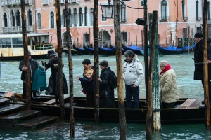 a gondola ferry to cross the Grand Canal