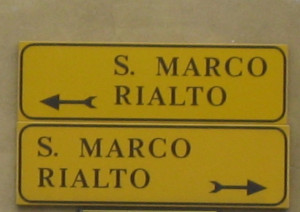 yellow street sign to give the main directions in Venice 